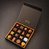 16 Piece Soft Centre Box: sixteen hand-painted soft centres in an open Donarch gift box
