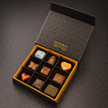 9 Piece Soft Centre Box: nine hand-painted soft centres in an open Donarch gift box